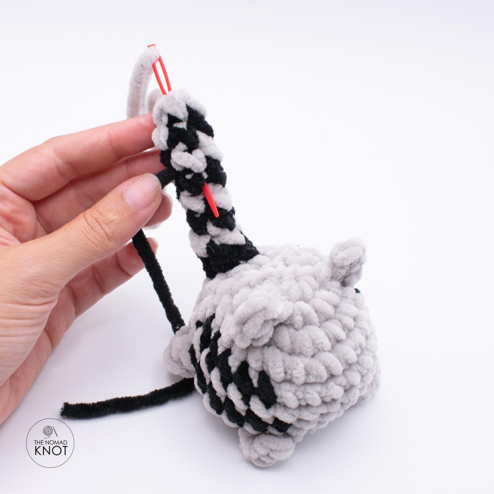 photo tutorial showing how to crochet a no-sew cat gray tabby free pattern