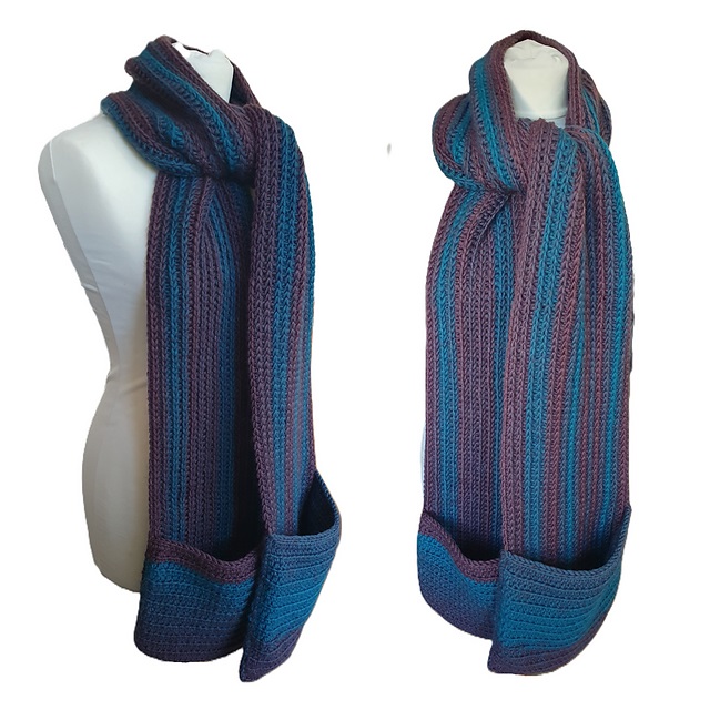 A side-by-side view of a long, ribbed crochet scarf with pockets, displayed on a white mannequin. The scarf features vertical stripes of purple and teal, and the deep pockets at each end are solid teal.