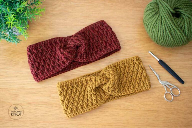 a crochet headband ear warmer on top of a wooden desk